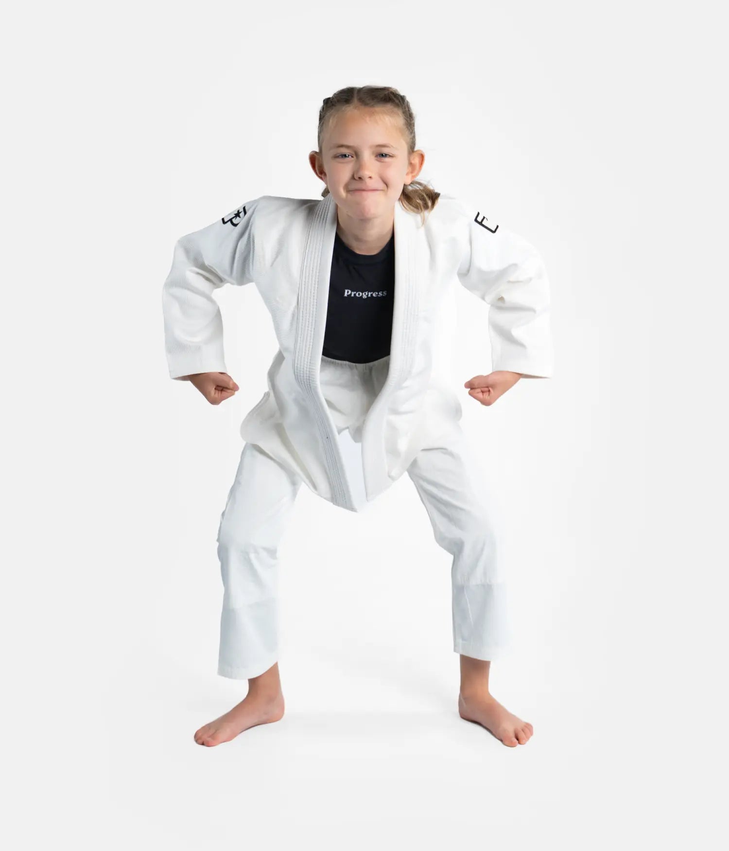 Kimono Brazilian Jiu Jitsu Progress Copii
Asezat pe un model 
Poza facuta din fata