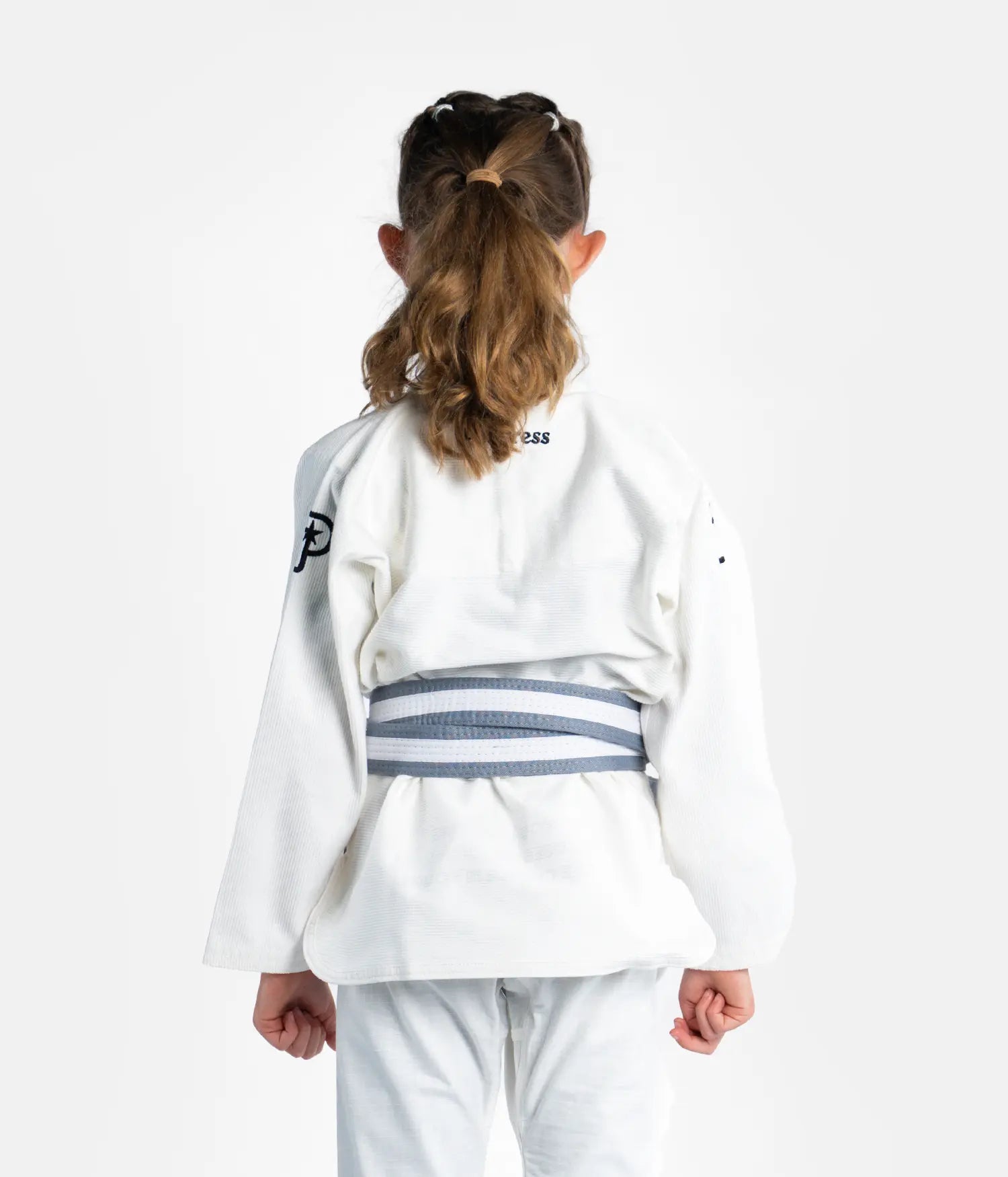 Kimono Brazilian Jiu Jitsu PROGRESS Copii
Asezat pe un model 
Poza facuta din spate
