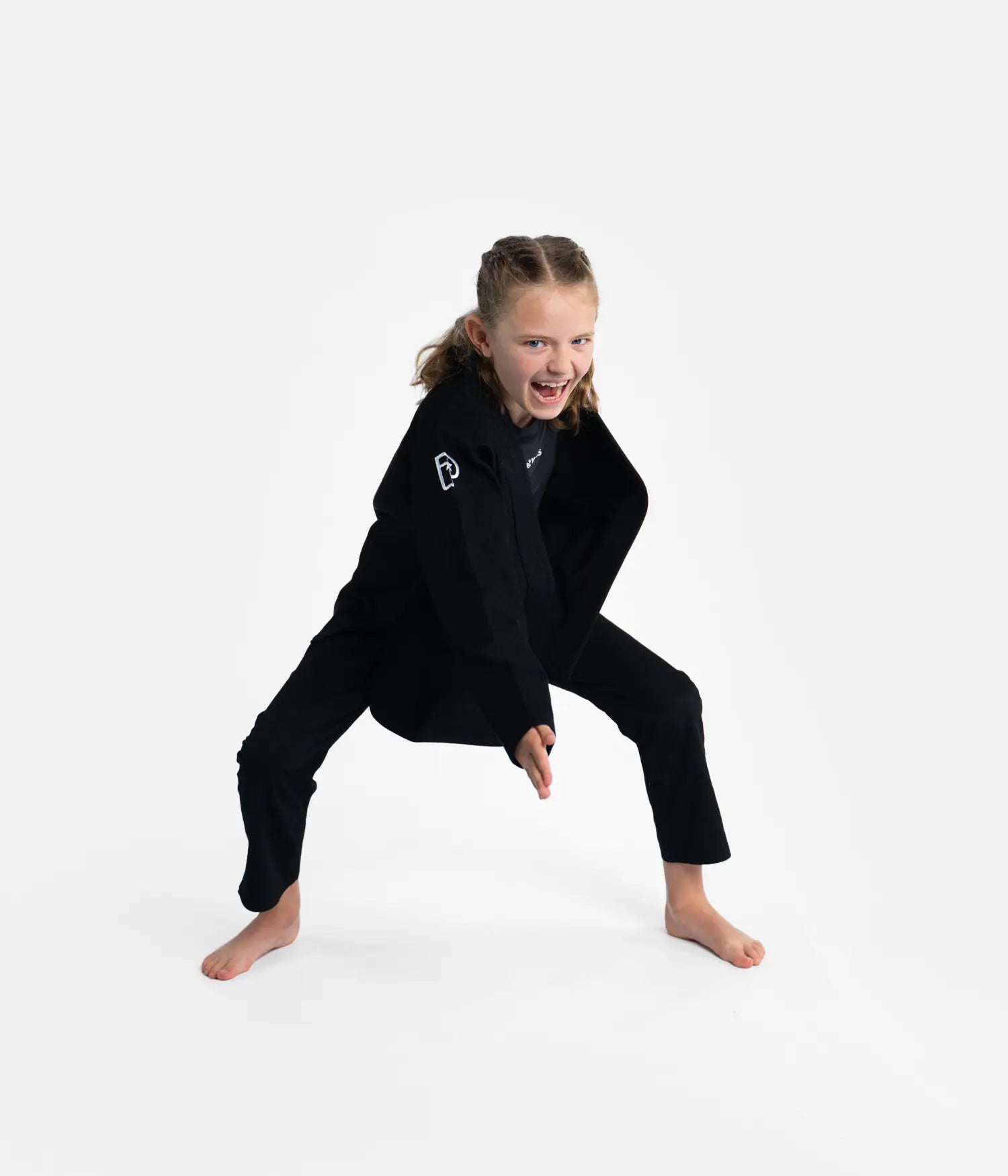Kimono Brazilian Jiu Jitsu PROGRESS Copii Negru poza facuta din fata modelului